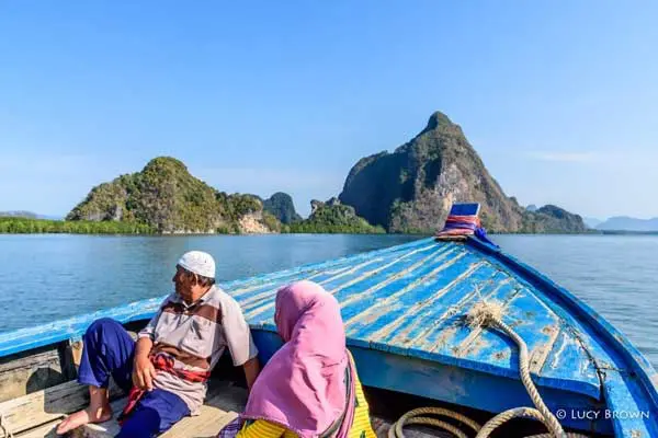Passengers on a public longtail boat from Ko Yao Noi to Phang Nga