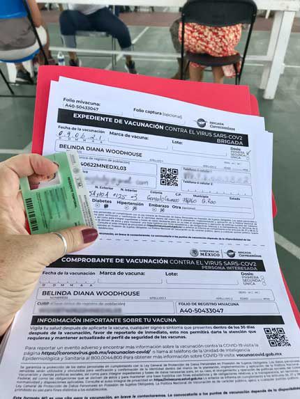 Vaccination-paperwork-and-residency-card (1)