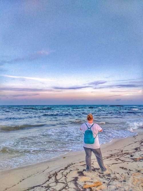 Beach clean ups with Caribbean sunsets